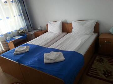 Фото номера Двухместный номер с 2 отдельными кроватями Гостевой дом Casa Mia г. Хацег 18