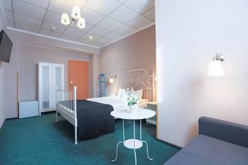 Фото номера Классический семейный номер Гостевой дом ArtMotel г. Хацег 2